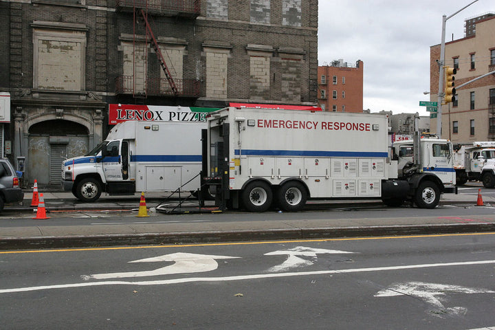 An emergency response truck parked on a street.